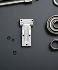 Heavy Duty Stainless Steel Trailer and Door Hinge With Silent Operation Triangle Hole Spacing 58x41mm Ideal for Harsh Outdoor and Coastal Environments Quiet Marine Grade Hinge for Dump Trailers and Containers; stainless hinge flat lay