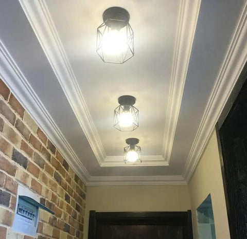 Dope Industrial Semi Flush Mount Ceiling Light Featuring A Sick Black Cage Design And Rustic Vintage Vibe Perfect For Compact Rooms With Easy E26 Led Compatibility And Badass Farmhouse Decor Accents, three lights in a hallway.