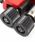 Close-up of Sheet Metal Bead Roller with 6 Dies for 22 Gauge Steel, showing industrial-grade steel rollers and red machine housing.