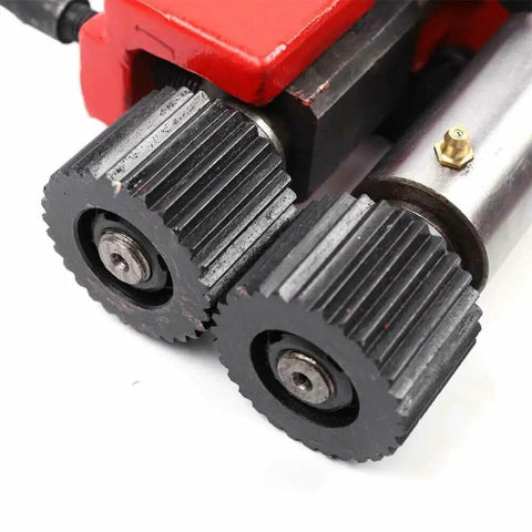 Close-up of Sheet Metal Bead Roller with 6 Dies for 22 Gauge Steel, showing industrial-grade steel rollers and red machine housing.