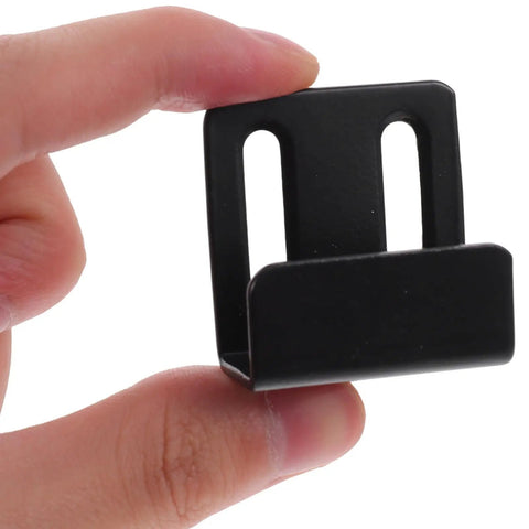 Heavy Duty Black Stainless Steel Tile Display Hangers, close-up of a wall mount hook held between fingers for mirrors and shelves.
