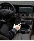 Ride Ready Smart Temp Control Car Mug in hand, digital display shows temperature, ideal for on-the-go coffee or tea.