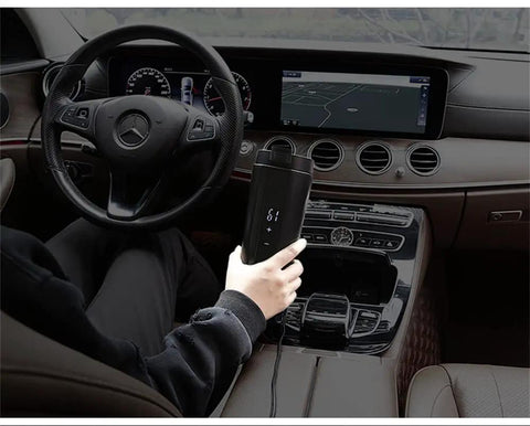 Ride Ready Smart Temp Control Car Mug in hand, digital display shows temperature, ideal for on-the-go coffee or tea.