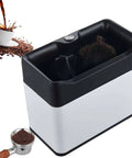 Electric Coffee Knock Box And Portafilter Cleaner With Dual Brush Heads, automatic filter holder scrubber with black and white design.