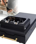 Professional Grade Electric 58 Mm Portafilter Cleaner With Automatic Puck Knock Box and Rapid Spin Handle Scraper, black and compact design.