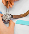 Timepiece Cleaning Putty For Watches Pro Grade Dry Clay Bar next to an open watch with tools, showing non porous surface cleaning