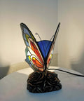 Butterfly Tiffany Style Stained Glass Accent Table Lamp Night Light Multicolored Warm White LED Included In Line Switch 8 Inches Wide 9 Inches Tall Perfect for Living Room Bedroom Decor on a table.