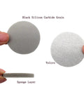 Grab This 48 Piece Set Of 2 Inch Flocking Sanding Sponge Discs With Hook And Loop Backing For Smooth Car Polishing Jobs That Peel Easy And Vent Dust Like A Boss. Image shows gray sanding discs with black silicon carbide grain and velcro backing.