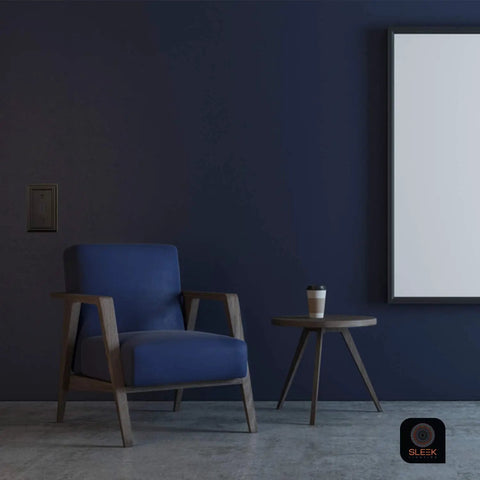 Pack Of Four Classic Black Wall Plate Covers For Outlets And Switches In One Gang Duplex Style on dark wall near chair