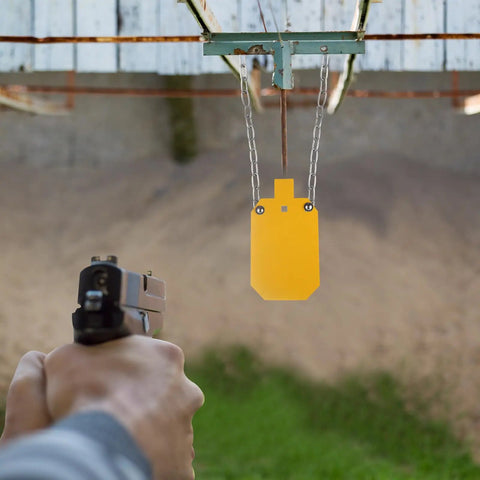 Person aiming at AR500 Steel Target With Gong Mounting Kit And Neon Color Hostage Target for outdoor range shooting
