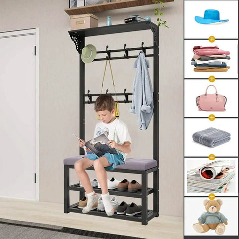 Child sitting on cushioned seat of Industrial Coat Rack Shoe Bench With 8 Hooks Freestanding Garment Hanger And Shelf Hall Tree