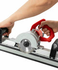 Professional Electric Tile Chamfering Machine With Solid Aluminum Base For Dead On 45 Degree Ceramic Edges Using Quick Swap Blades. User holding machine.