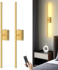 Slick Wireless Rechargeable Wall Sconces Set Of 2 Battery Powered Gold Light Fixtures mounted in a bedroom with remote control.
