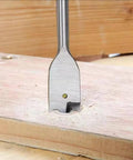 Spade paddle drill bit, 3/8-inch, hex shank, cutting into wood.