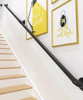 Rock Solid Black Wrought Iron Stair Handrail Wall Mounted Banister With Heavy Duty Brackets For Indoor Outdoor Porch Deck 15 Feet Built To Last Quick Diy Setup, seen on a staircase with wooden steps.