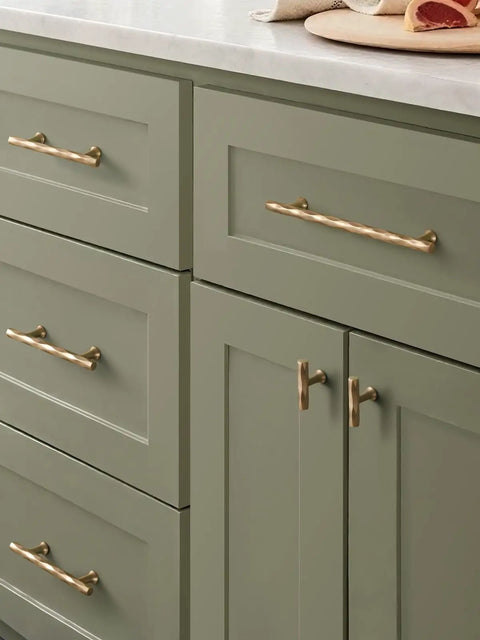 Champagne Bronze Cabinet Pulls 5 Inch Hole Center 10 Pack No Brainer Durable Hammered Sleek Handles installed on green kitchen drawers