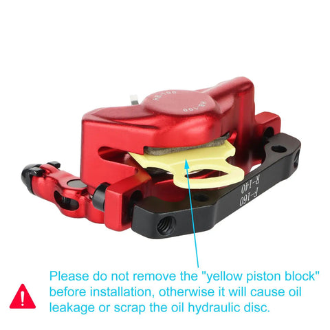 HB 100 Hydraulic Disc Brake Calipers Front And Rear Set, red finish with yellow piston block, installation warning label visible