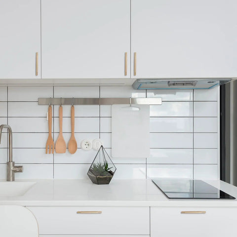 Modern kitchen with Champagne Bronze Knurled Cabinet Handles Set, 30 Pack, 6-1/4 Inch (160mm) Gold Knurled Pulls on white cabinets.