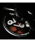 Hit Your Sweet Spot With This Heavy Duty Wdt Needle Distributor Engineered For 58mm Espresso Portafilters To Crush Stubborn Clumps And Elevate Your Roast Game, showing stainless steel tool over coffee grounds.