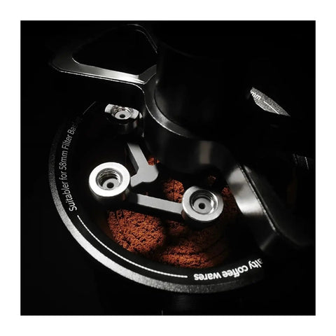 Hit Your Sweet Spot With This Heavy Duty Wdt Needle Distributor Engineered For 58mm Espresso Portafilters To Crush Stubborn Clumps And Elevate Your Roast Game, showing stainless steel tool over coffee grounds.