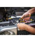 Person using Pitbull Dual Material 4 Piece Plier Set With High Leverage Joint Beastly Grip And Cross Hatched Jaw Teeth For Superior Cutting Gripping And Pulling Power 82203C on car engine