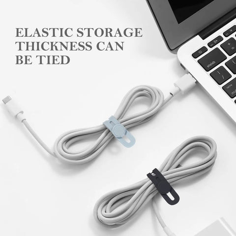 Silicone Cable Ties Set, 30 Pcs Reusable Washable Cable Management Straps With Adjustable Lock Buckles, High Elasticity For Home Office School Travel, Tangle Free Cord Organizer In Six Colors securing cables next to a laptop.