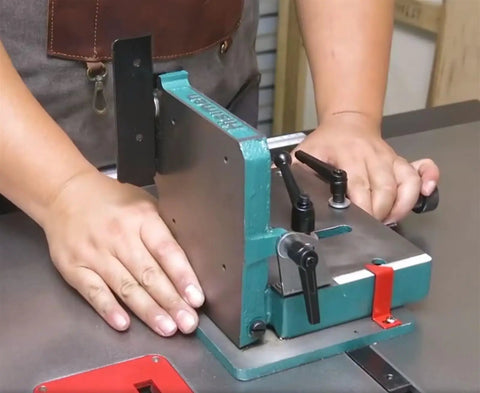 Heavy Duty Woodworking Tenoning Machine Desktop Drilling Jig For Dead On Alignment with clamps and adjustments visible on workstation.