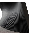 Sculpted wave base detail of Rock Solid Adjustable Sit Stand Desk With Integrated Charging Outlets, black textured surface.