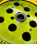 Close-up of Heavy Duty Electric Rebar Bender Workhorse wheel with various sized holes for bending rods.