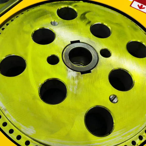 Close-up of Heavy Duty Electric Rebar Bender Workhorse wheel with various sized holes for bending rods.