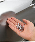 Get Those Dings Gone With These 50 Silver Metal Car Body Repair Welding Studs 4mm in hand for dent pulling and bumper fixes.