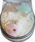 Heavy Duty Resin Toilet Seat Cover With Slow Close Lid Universal Fit Bathroom Upgrade Quick Snap Setup Smooth Water Repellent Finish Built Tough For Everyday Use featuring a decorative beach theme.