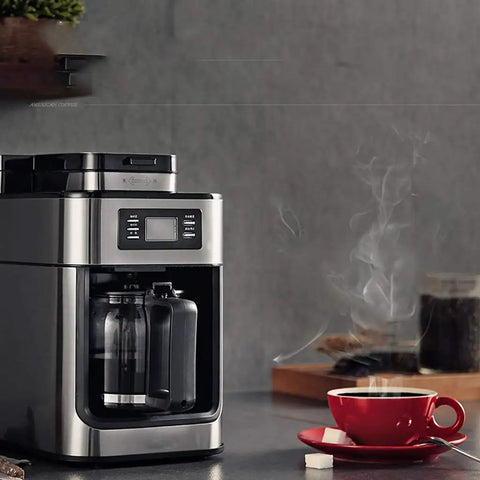 No Sweat Fully Automatic Bean To Cup Coffee Maker Featuring A Built In Grinder Smart Permanent Filter with steaming coffee mug.