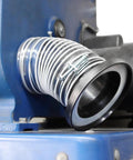 4-inch magnetic dust-collector hose fitting attached to a blue dust collector, metal spiral hose with clamps