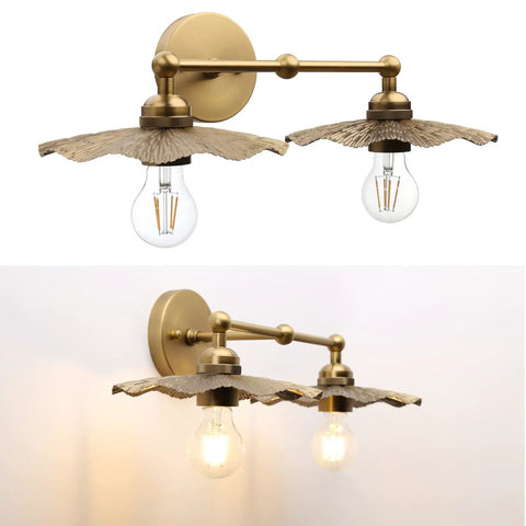 Two Light Industrial Metal Wall Sconces With Antique Brass Flower Ripple Shade, mounted on wall, bulbs visible, retro farmhouse lighting.