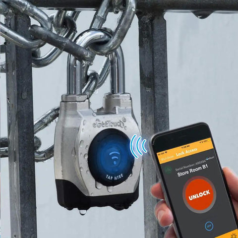 4Th Gen Outdoor Smart Padlock With Bluetooth And NFC, Weatherproof And Rugged For Commercial Use, shown on metal gate with phone app access