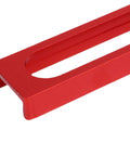 Close-up of red aluminum base plate from Beefy No Slip Aluminum Bench Stops Set, 10 Pieces With 2 Base Plates For 20mm Diameter Woodworking Workbench Fixation.