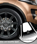 Close-up of metal tire valve caps with car logo on vehicle wheel, showing Valve Stem Covers With Car Logo, Metal Tire Valve Caps For Cars