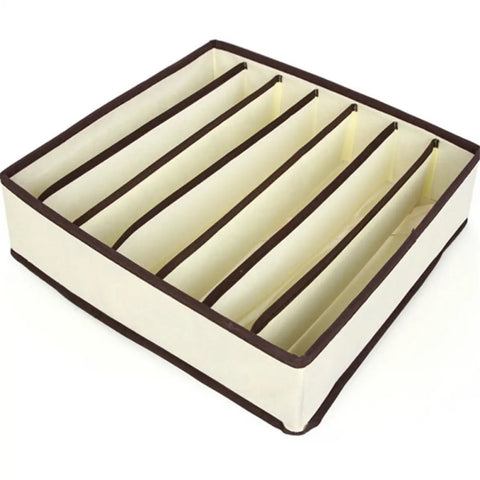 Four Piece Plastic Drawer Organizers With Six Seven Eight Compartments In Warm Beige For Top Shelf Closet Sorting And Office Cleanup That Keeps All Your Gear Neatly Stacked Without The Sweat - open top organizer with beige compartments.