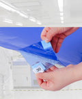 Heavy Duty Sticky Door Runners Trap Muck And Debris From Heavy Foot Traffic With Resilient Polyethylene Matting, peel-off layer detail.