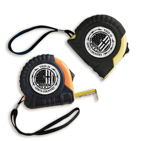 Solid Build Personalized Tape Measure For Woodworking And DIY Projects Featuring This Is Gods Country Engraving in black and orange.