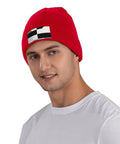 Black And White Piano Plate Grid Knit Beanie Soft Acrylic Winter Hat For Freezing Temperatures worn by a man in red.