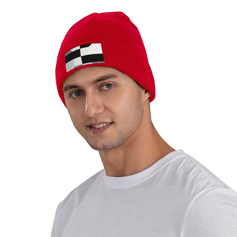 Black And White Piano Plate Grid Knit Beanie Soft Acrylic Winter Hat For Freezing Temperatures worn by a man in red.