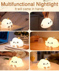 LED Cloud Night Light With 16 Color Options Silicone Cloud Lamp on table, demonstrating versatility and dimmable features.
