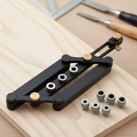 Precision Aluminum Dowel Jig Drill Guide with threaded bushings on wood surface for accurate woodworking joinery.