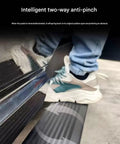 Foot positioned on Plug And Play Deployable Running Boards For Tesla Cybertruck showcasing anti-pinch feature and sleek design.