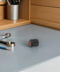 Ultimate Plasma Cutter Start Cartridge Replacement For Thermal Cutting Torch on a desk, showcasing heat-resistant material and compact design.