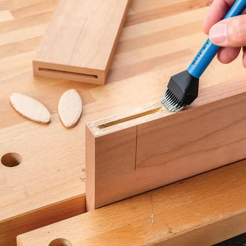 Easy Clean Silicone Glue Spreader For Biscuit Joinery With Dual End Design applying glue to wood slot
