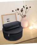 Tour Ready Waterproof Drum Backpack And Oxford Cloth Gig Bag With Padded Adjustable Straps sitting on a wooden table.
