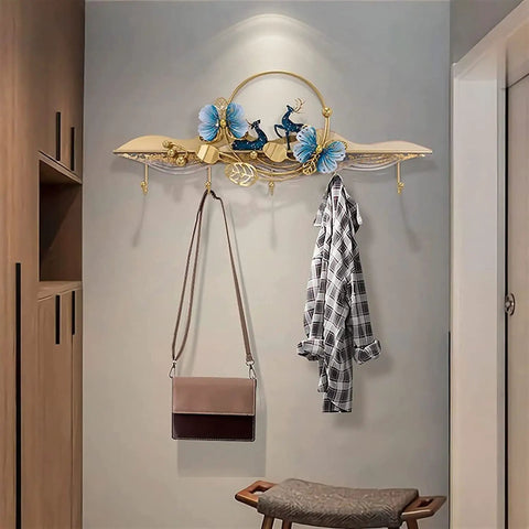 Heavy Duty Wall Mount Coat Hooks For Entryway And Closet, Tough As Nails Metal Rack Holding coats and bags on a wall.